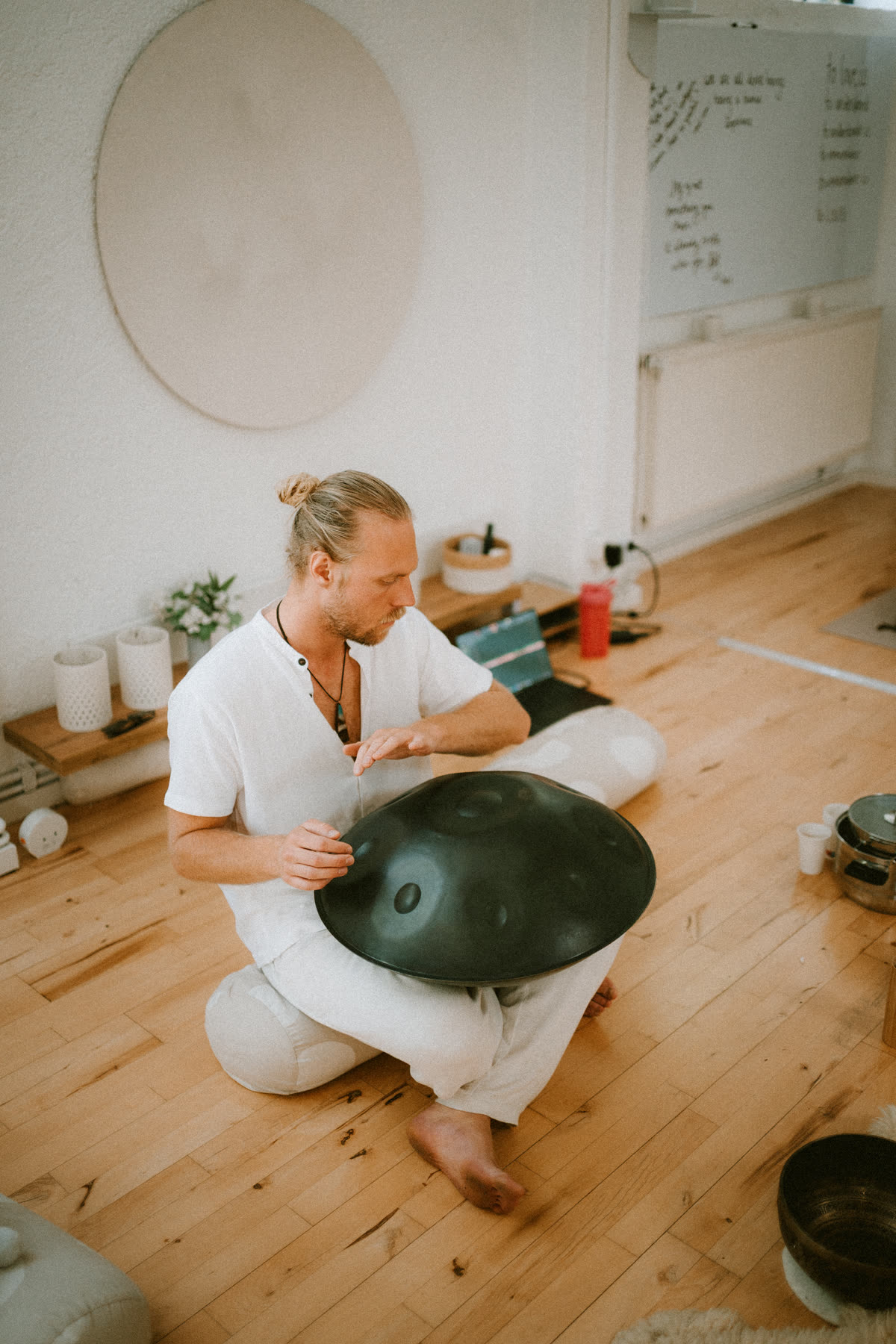 Tobias Malm playing the handpan on the studio floor